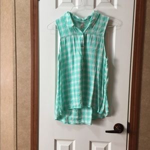 Sleeveless, plaid button down shirt. Medium.